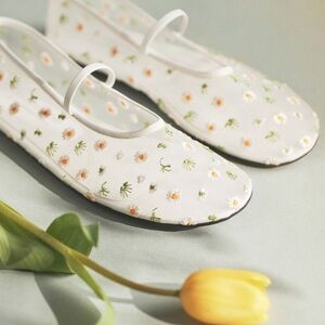 The Jeffrey Campbell Floral Mesh Flats by Anthropologie.